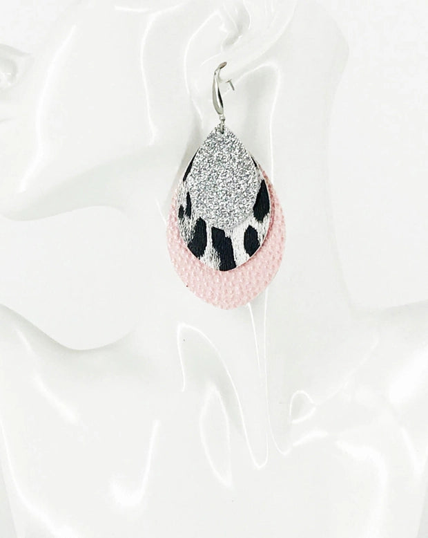 M&P Pink Litchi Grain Texture Faux Leather and White and Black Leopard Faux Leather Layered Earrings and a Silver Glitter Backing with Silver Tone Stainless Steel Findings and Ear Wires.